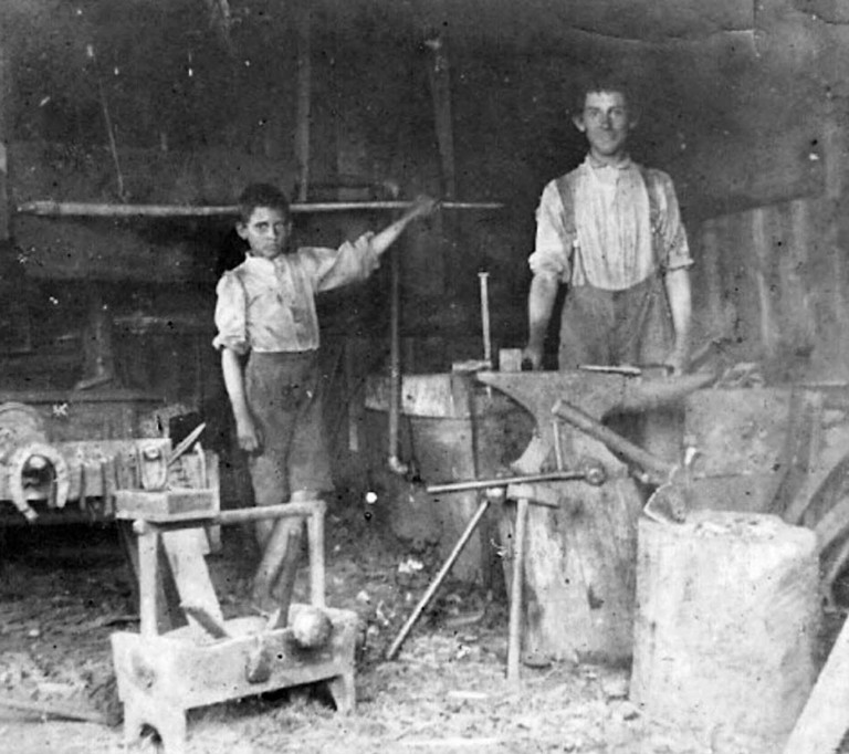 rare-view-inside-a-blacksmith-shop-early-1900s..jpg
